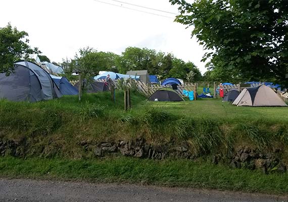We use our orchard (also terraced) for additional camping.